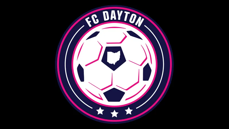 Hai đội cầu thủ Dayton và West Virginia tranh chấp quả bóng trên sân cỏ Hai đội cầu thủ Dayton và West Virginia tranh chấp quả bóng trên sân cỏ